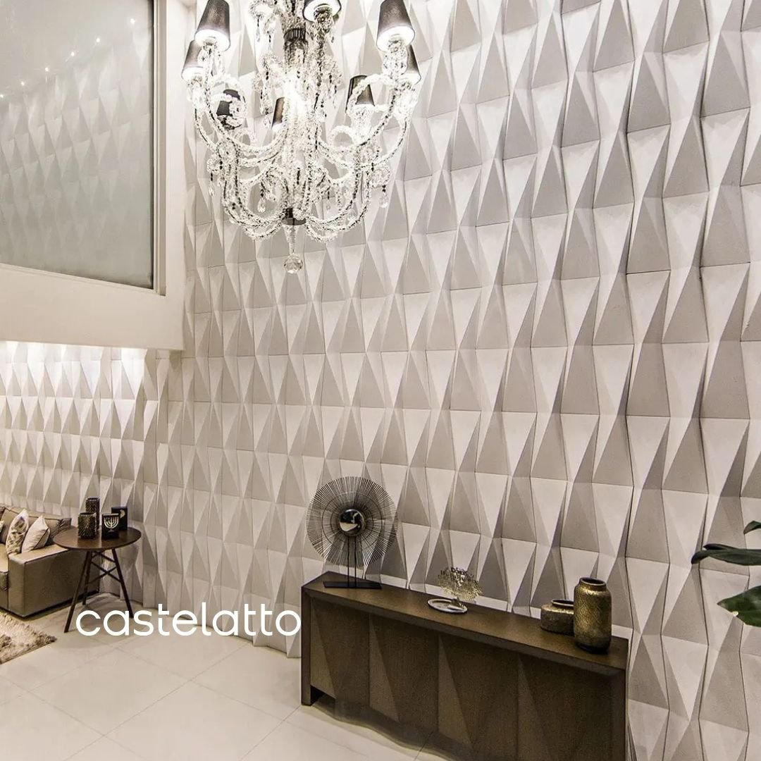 Cimentício Origami Castelatto aplicado em parede com design tridimensional